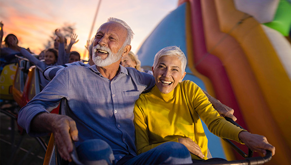 Elderly couple on rollercoaster